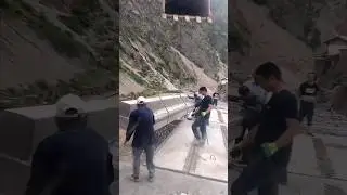 The process of laying precast reinforced concrete slabs for bridges
