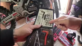 Repairing a stripped thread on the crankcase of a 2003 KX250 with Heli coil repair kit