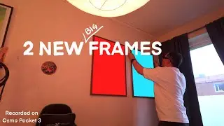 Two new big picture frames on the wall, room update.