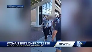 Woman accused of spitting on teen protester