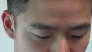 Man Straps on HTC Vive VR HMD - Free 4k Stock Footage