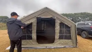 Camping alone outdoors in the pouring rain - and preparing a delicious camping meal over a wood fire