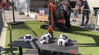Hitachi mini excavator basketball challenge for kids at the Pladdet Open Day in Holland