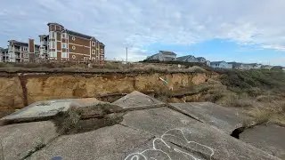 Buildings Crumbling Into The Sea