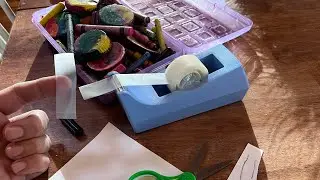 Using Scotch Magic Tape dispenser