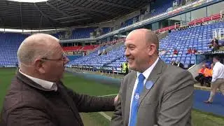 Ken Clark talks to Steve Melledew Burghfield FC's Manager before the BTC