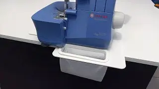 Tapete recolector de residuos para m&aacute;quina Overlock o remalladora Familiar