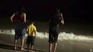 Having fun at Mumbai beach with my children.