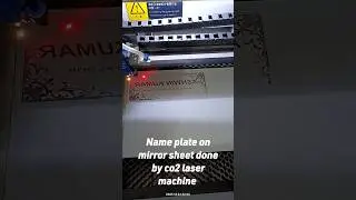 name plate on pink mirror sheet done by co2 laser machine