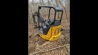 Two hours in to day 1 of renting a mini excavator and skid steer I get them both stuck