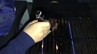 Boys cooking on the BBQ