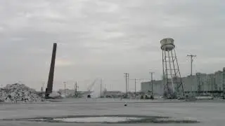 Implosion of water tower and smokestack at former Military Ocean Terminal in Bayonne