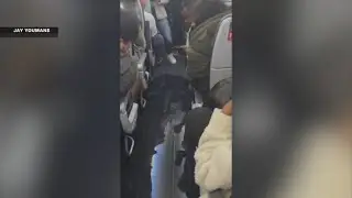 Burst pipe in plane cabin delays Florida family's trip home