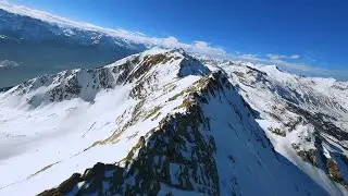 LONG RANGE over these SNOWY MOUNTAINS