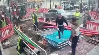 Fight between construction worker and pedestrians