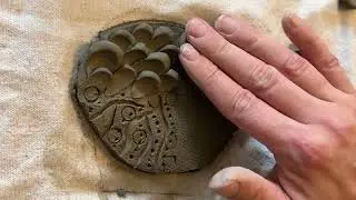 Applied and incised textures in clay