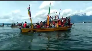 Prosesi adat dalam rangka perayaan    Injil masuk di tanah papua