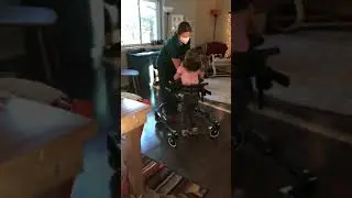 Girl with Rare Chromosomal Disorder Learning to Walk with Gait Trainer Without Saddle