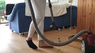 Vacuuming Lego in Black socks
