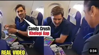 ms dhoni playing candy crush | air hostess offers chocolates to ms dhoni | dhoni playing candy crush