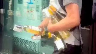 Riot thugs loot booze from Sainsbury's in Manchester | SWNS