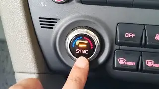 What does the SYNC button do in Kia Sportage
