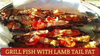 Amazing Grill fish 🐟 with lamb tail fat by Street Travel Foodie