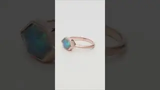Lot 62: 14kt Gold Custom Lozenge Cut Ethiopian Opal Ring