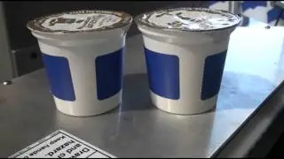 700VS Labeling Tapered Containers