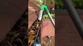 Removing Trapped Leaves and Debris on a Gutter | Dan's Windows and Gutters