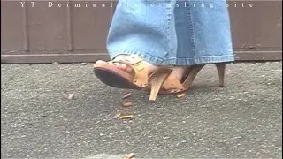 Nice looking office worker's high heels on a cigarette break