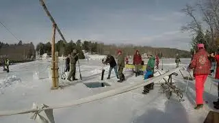 Using a antique ice saw at Brookfield ice festival