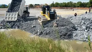 Amazing project Bulldozer Pushing Stone Fill the project with dump truck delivery soil quickly 