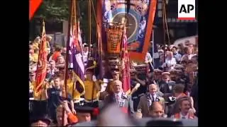 N. IRELAND: ORANGE ORDER MEMBERS MARCH PAST DRUMCREE CHURCH