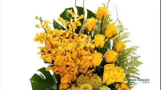 Sunrise in Weston is a flower arrangement elaborated with yellow flowers, from orchids to roses.