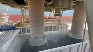 Truck loading spout for the effective loading of clinker in a port terminal