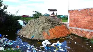 Complete the project by pushing rocks into a deep, deep sewer with lots of trash.
