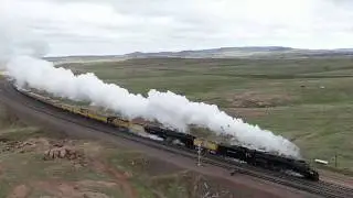 Aerial shots of the UP 4014 (Big Boy) at Tie Siding (WY) with a huge plume of steam