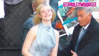 Elle Fanning Signs Autographs For Fans While Arriving At Jimmy Kimmel Live! Studios In Hollywood, CA