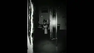 spamton ominously staring from toilet