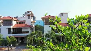 Architecture and greenery rolls on like an eternal suburbia | Panache