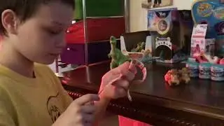 Ayden opening Disney Pixar Mashems
