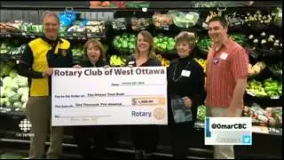 West Ottawa Rotary Club at McKeen Metro for the Ottawa Food Bank - CBC News, 24 JAN 2015 v 3