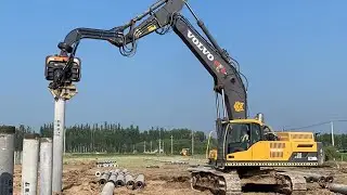 Yantai Juxiang Hydraulic sheet pile post driver, vibro hammer working at solar site