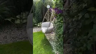 DIY Backyard Transformation: Creating a Cozy Retreat with Egg Chairs and Lush Landscaping