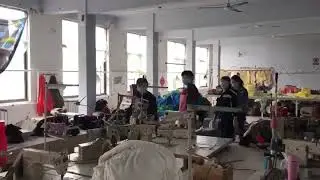 THTC Clothing founder visiting one of their factories in China