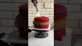 stacking the red velvet strawberry cheesecake layers yum yum #cake #baking #ganache #cakedecorating
