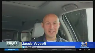 WBZ-TV meteorologist Jacob Wycoff, late for work due to traffic jam, broadcasts forecast from his ca