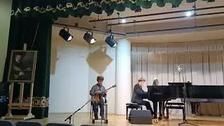 Давлатов Дмитрий(9лет), балалайка. В. Андреев Вальс(Грезы), Г. Перселл Канцонетта, Шуточная.