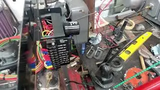 New fuse box from Painless Wiring, voltage regulator and ballast resistor installed.